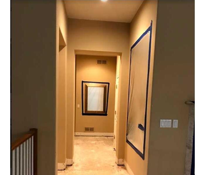 Repair of hallway water damage after a storm causes water damage in hallway of home near Boulder