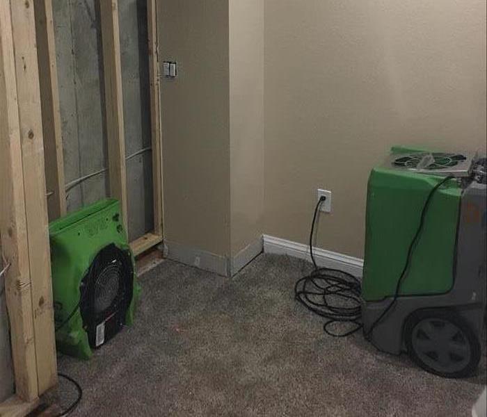 Water damage mitigated by servpro of greater boulder in basement on baseboard trim in Boulder resident's home 