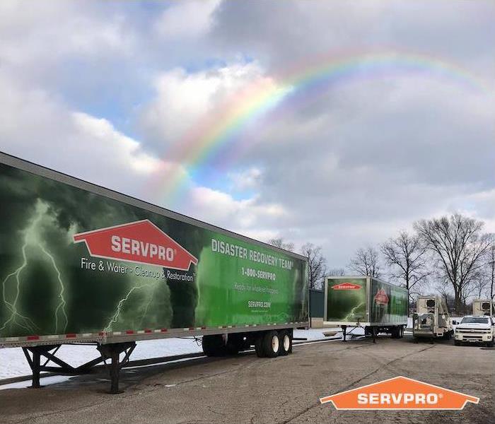 SERVPRO commercial trailers with rainbow above it