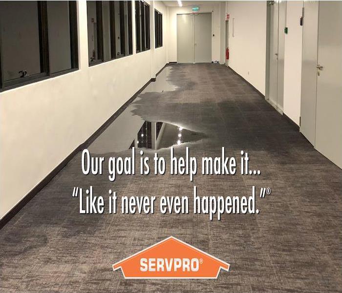 commercial hallway with SERVPRO logo
