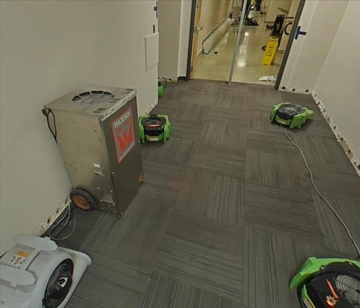 SERVPRO dehumidifiers and fans drying out a Boulder Valley School District school
